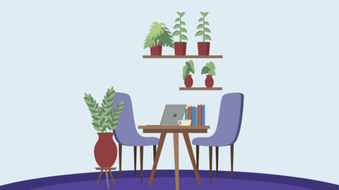 A table with two chairs and variety of plants