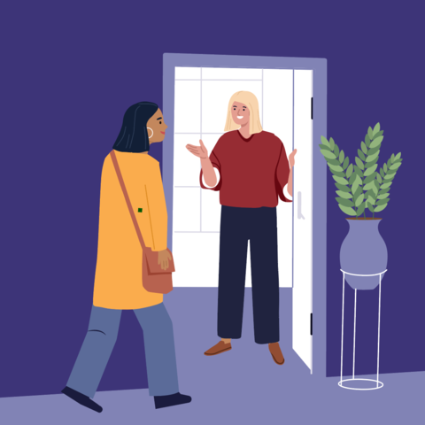 two people at an office doorway