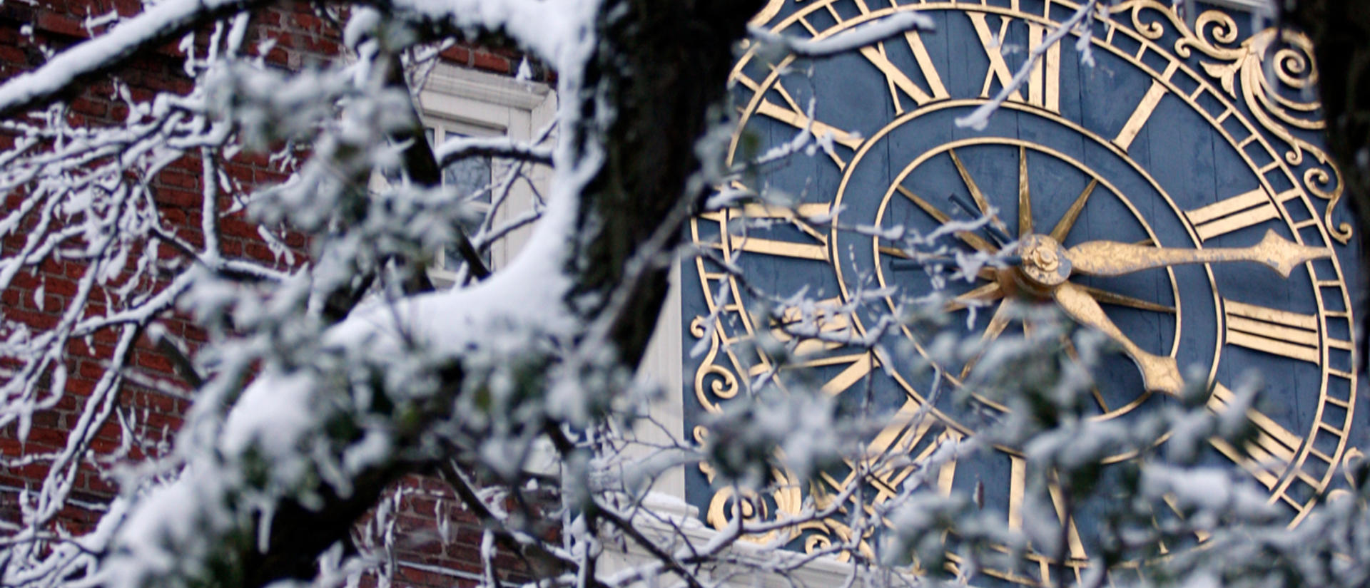 Snow in front of clock tower