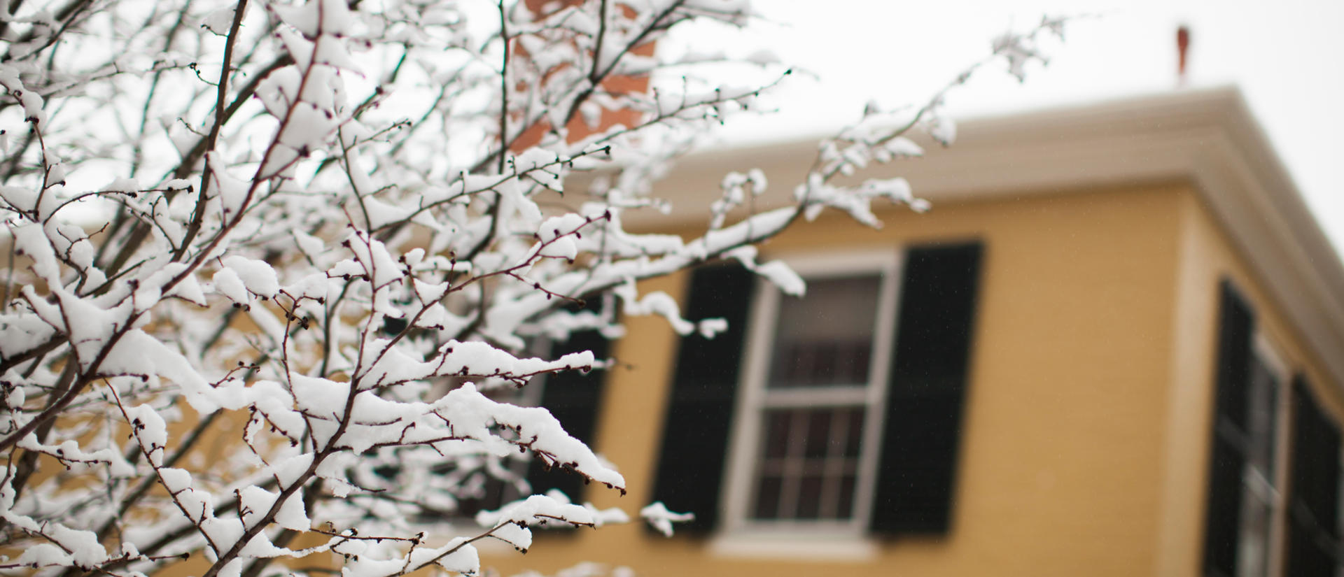 Snow in front of building